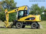 CAT M 313 D Mobilbagger - Baumaschine, Caterpillar, USA - fotografiert zum 6. Tatra-Treffen Seehausen am 19.09.2009 - Copyright @ Ralf Christian Kunkel 
